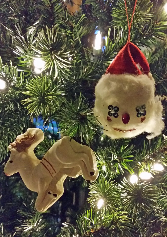 Our first hand-made Santa ornament and a sugar and icing ornament made in a wooden mold from Germany